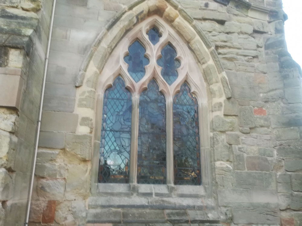 new tracery on the Saint Luke window